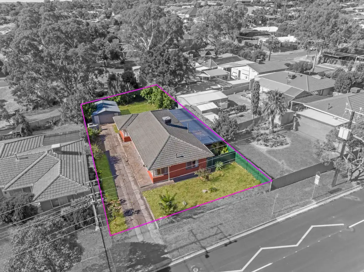 Aerial with the property boundary outlined for the listing