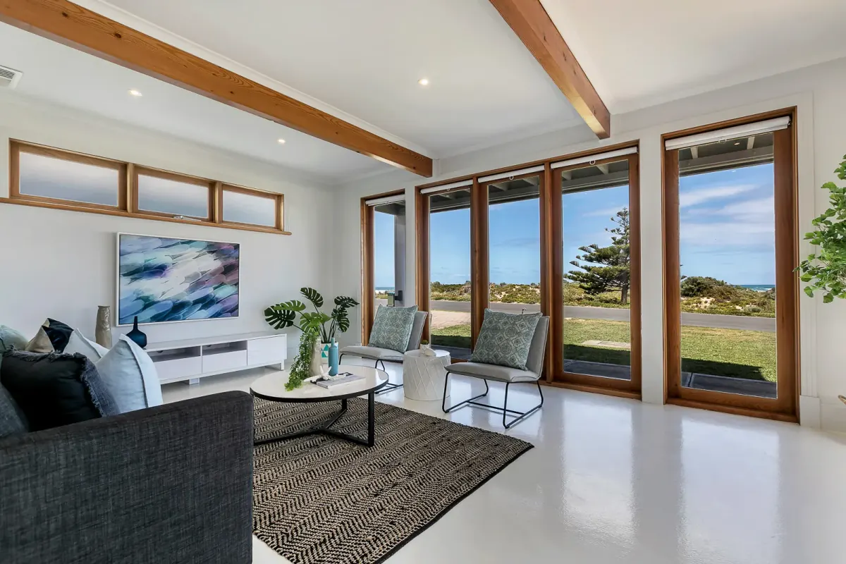 Coastal living room with a view to the water, in the agent’s gallery